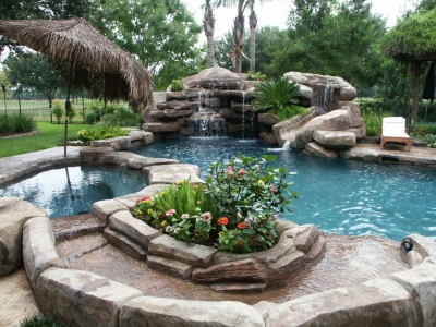 Laguna Pool with a waterfall feature and jacuzzi