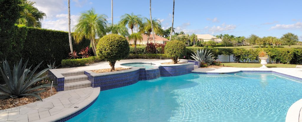 luxury swimming pools in an El Paso home's backyard